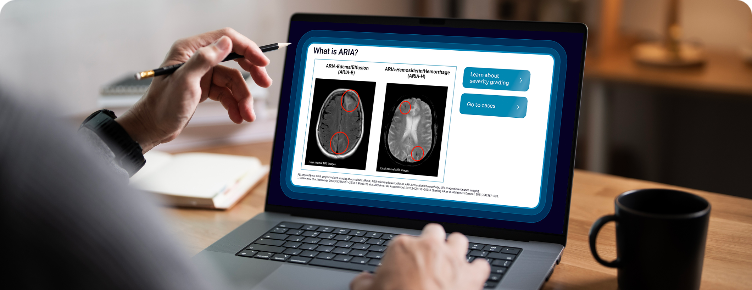 An image showing an individual looking at a computer screen